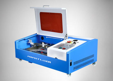 Macchina per incisione laser CO2 con raffreddamento ad acqua da 40W per materiali pubblicitari
